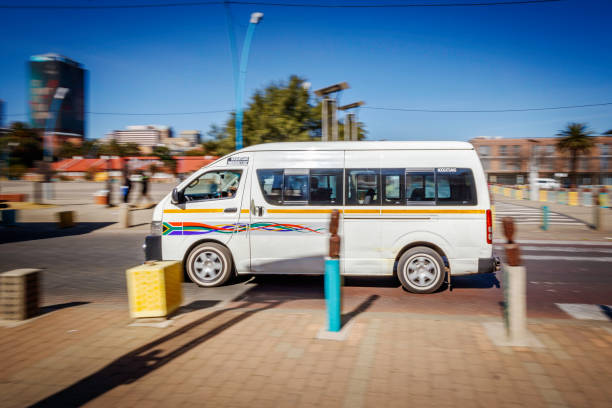 Moving taxi going past in Johannesburg city.  Johannesburg, also known as Jozi, Jo'burg or eGoli, "city of gold" is the largest city in South Africa.